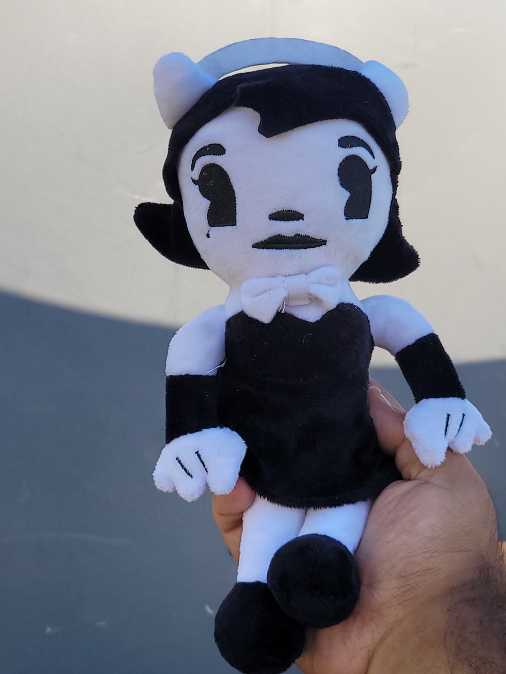 Black & White Plush Cartoon Doll with Bow Tie